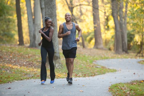 Couple running in Rock Creek Park