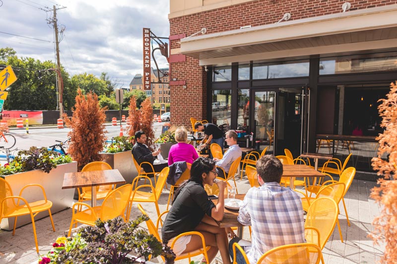 Diners on patio at Brookland Pint - Restaurant and bar in Brookland Washington, DC