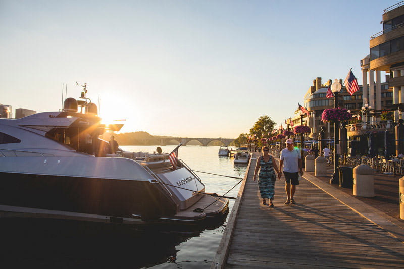 Summer sunset at the Washington Harbour at the Georgetown Waterfront - Waterfront activities and things to do in Washington, DC